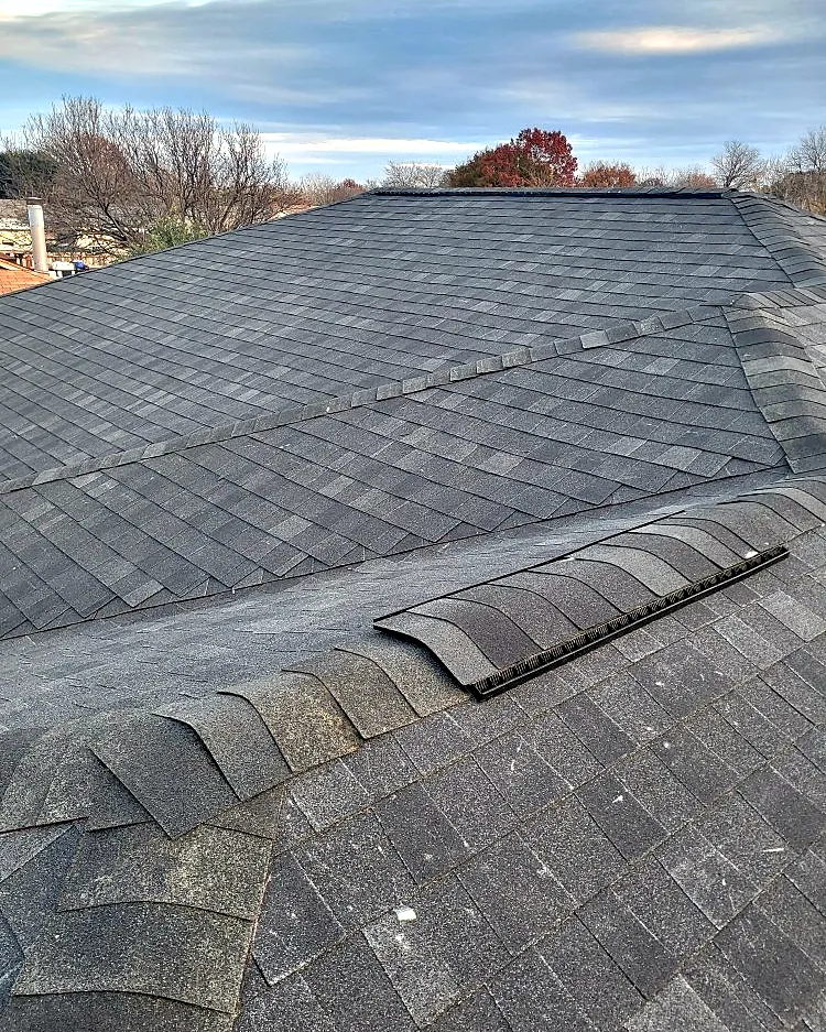 Ridge vent installed along a new shingle roof